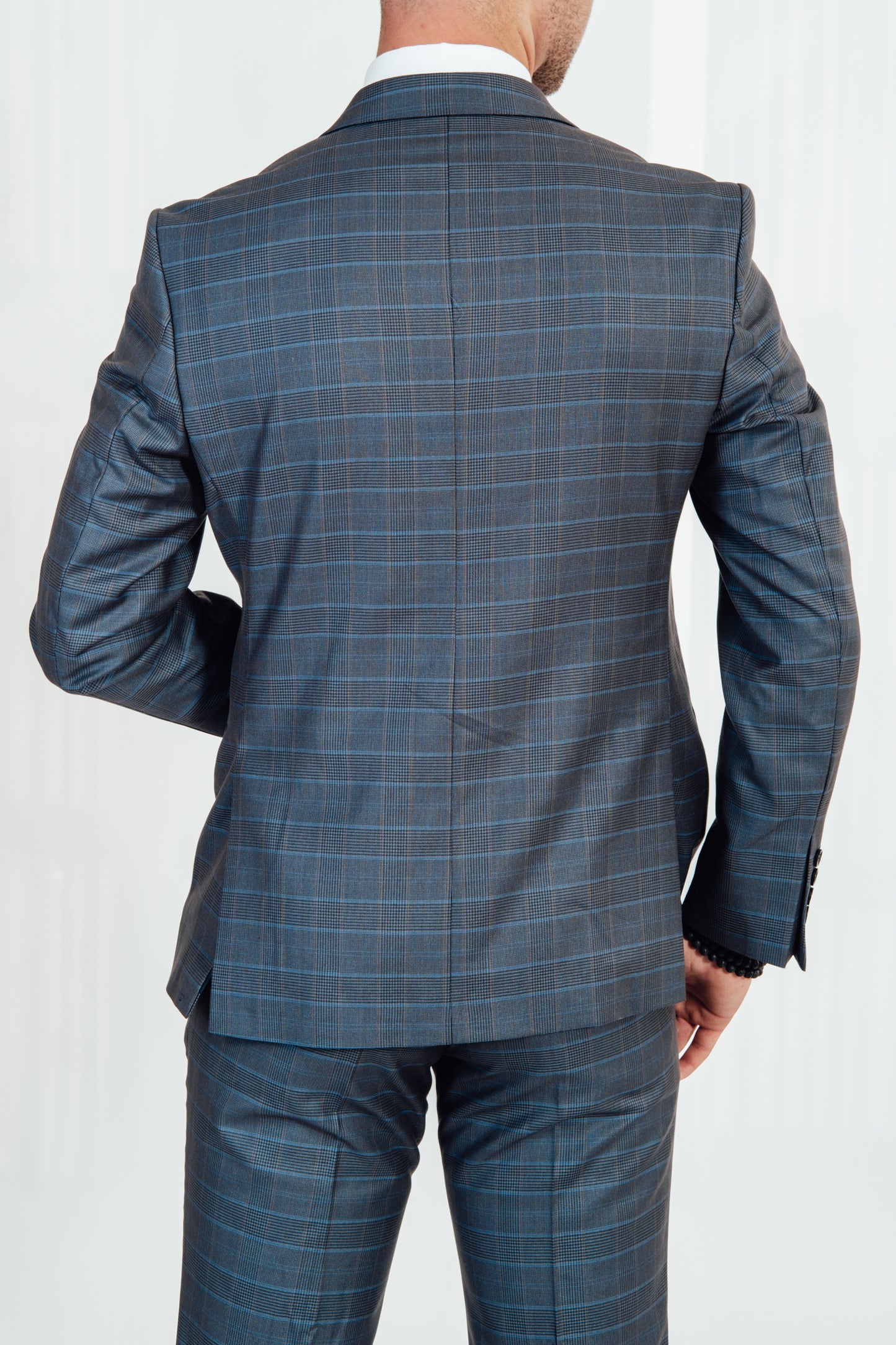 Suitify kostuum blauw kleine ruit achterkant