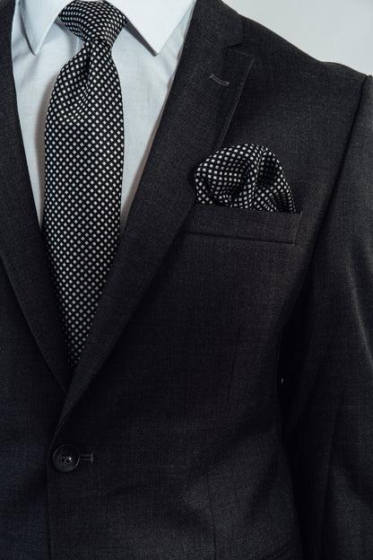 Details van een grijs effen kostuumvest van Suitify